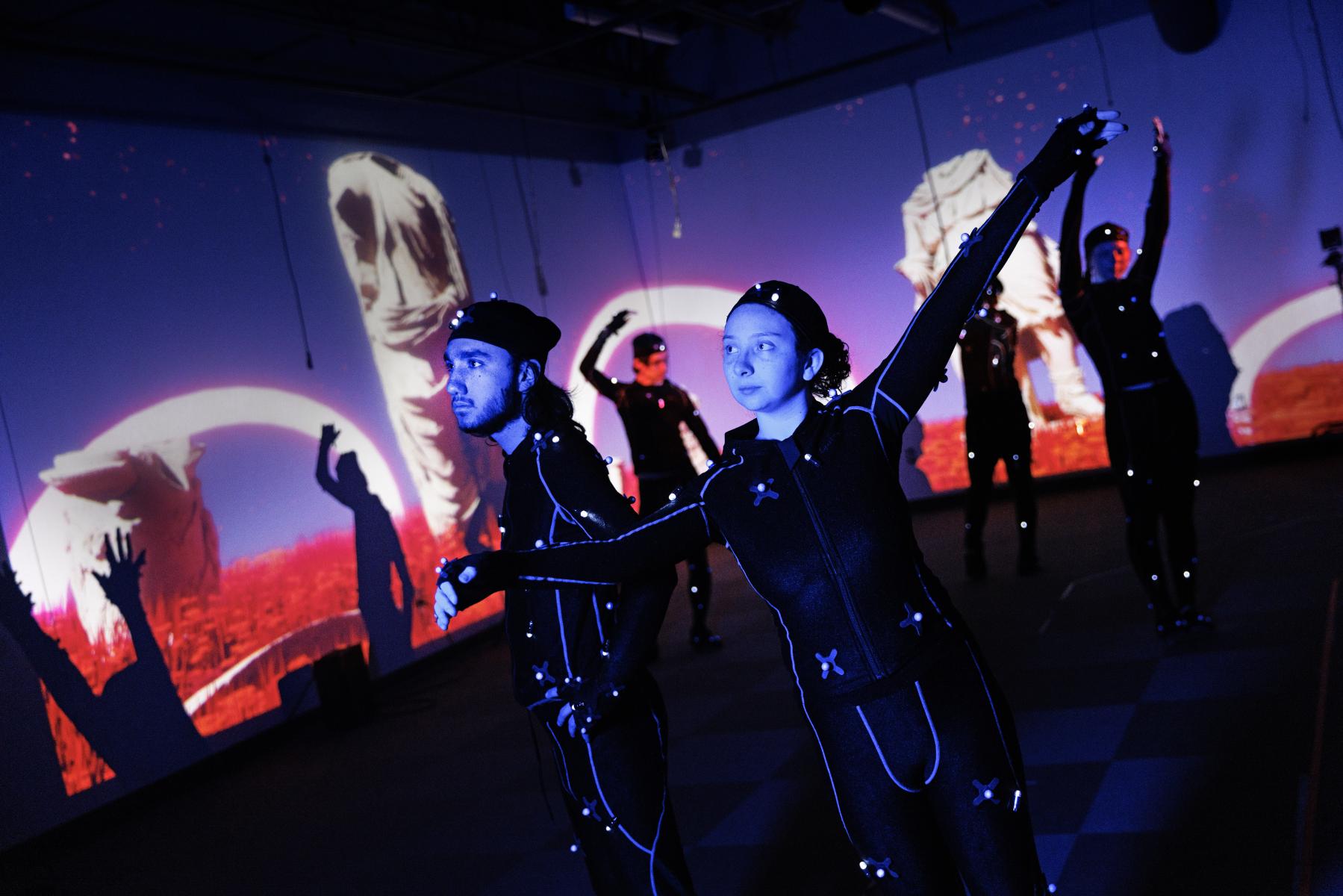 two EMA students performing mocap at Carson center/></noscript><img alt=